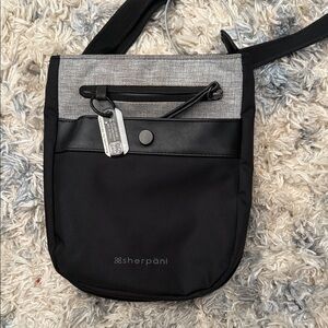 Sherpani Two-Tone Black and Gray Messenger Bag